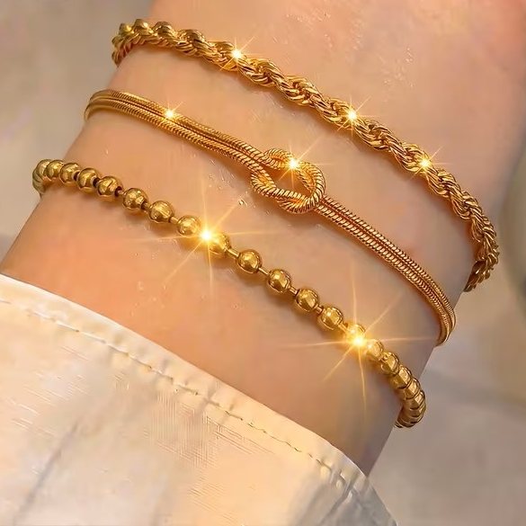 Pulseiras douradas em aço inox